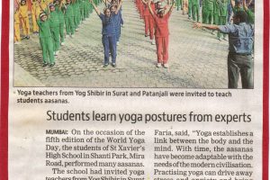 Students Learn Yoga Postures from experts